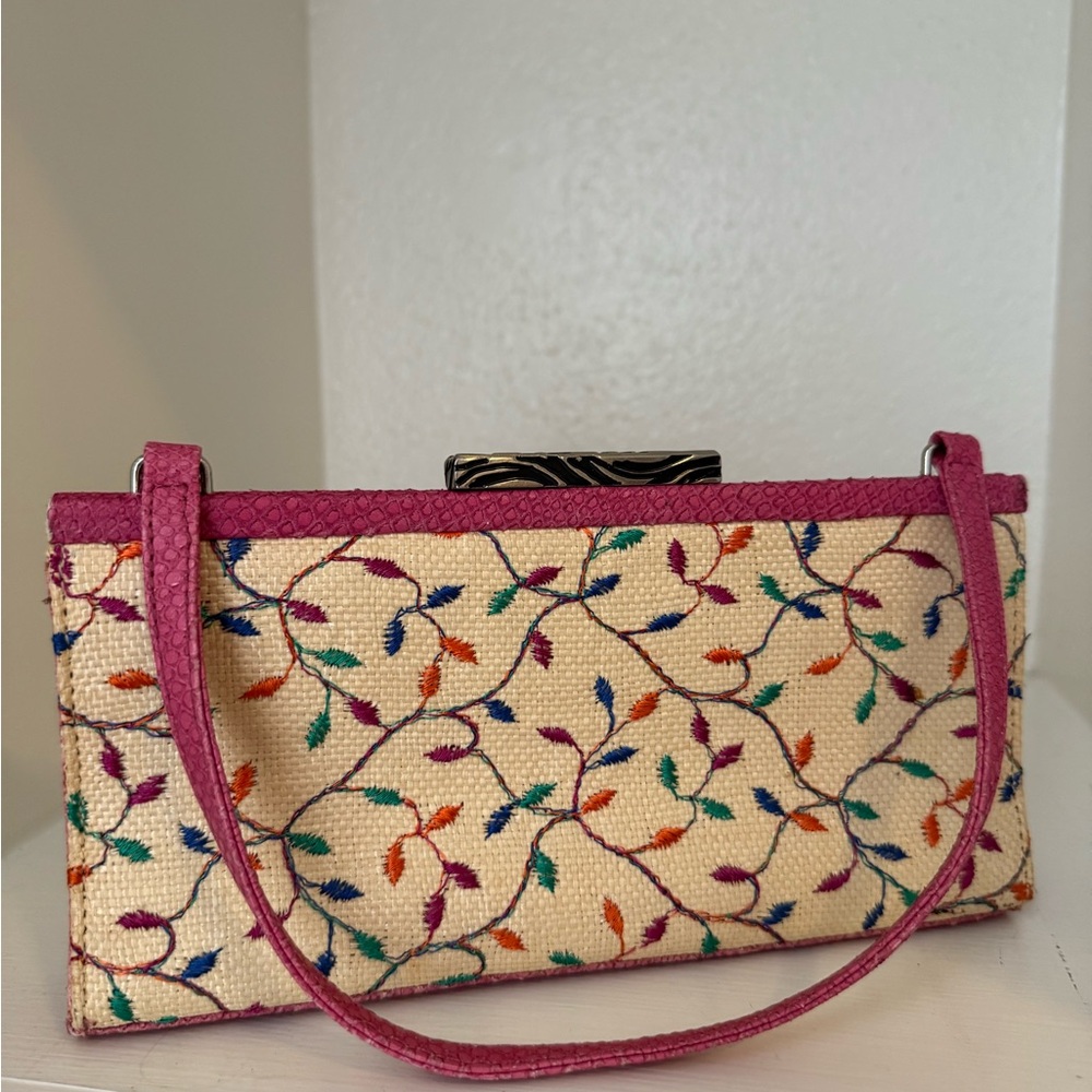 Vintage Adrienne Vittadini natural woven clutch with an embroidered leaf design